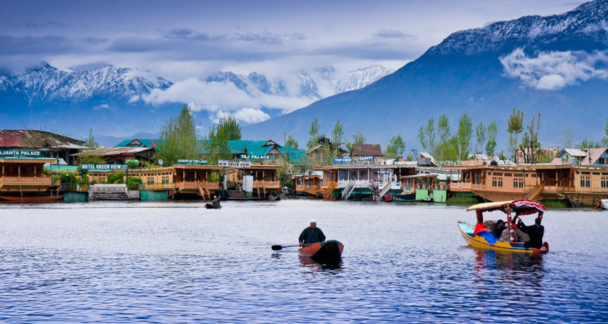 Explore Srinagar's Dal Lake, Shikara rides, houseboats, Mughal gardens, and floating markets.